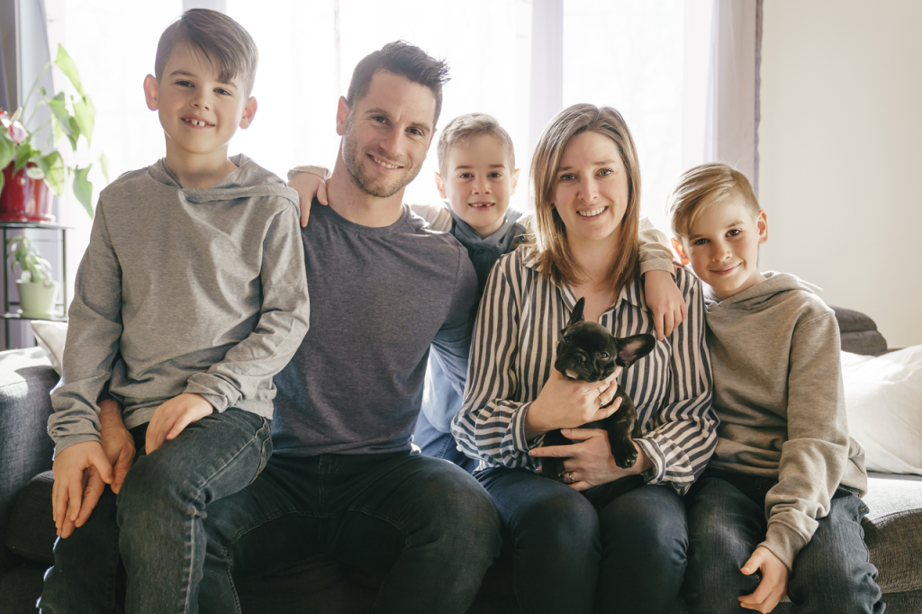 Choosing the Perfect French Bulldog Puppy: Expert Guide Happy Family With Their French Bulldog Puppy - Top Frenchie